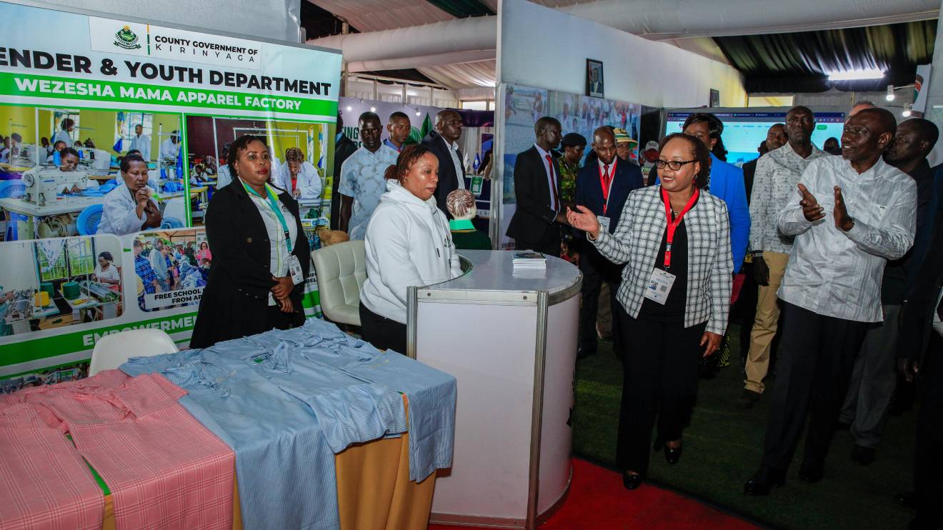 Anne Waiguru taking President William Ruto on a tour of Kirinyaga County stand. PHOTO/COURTESY